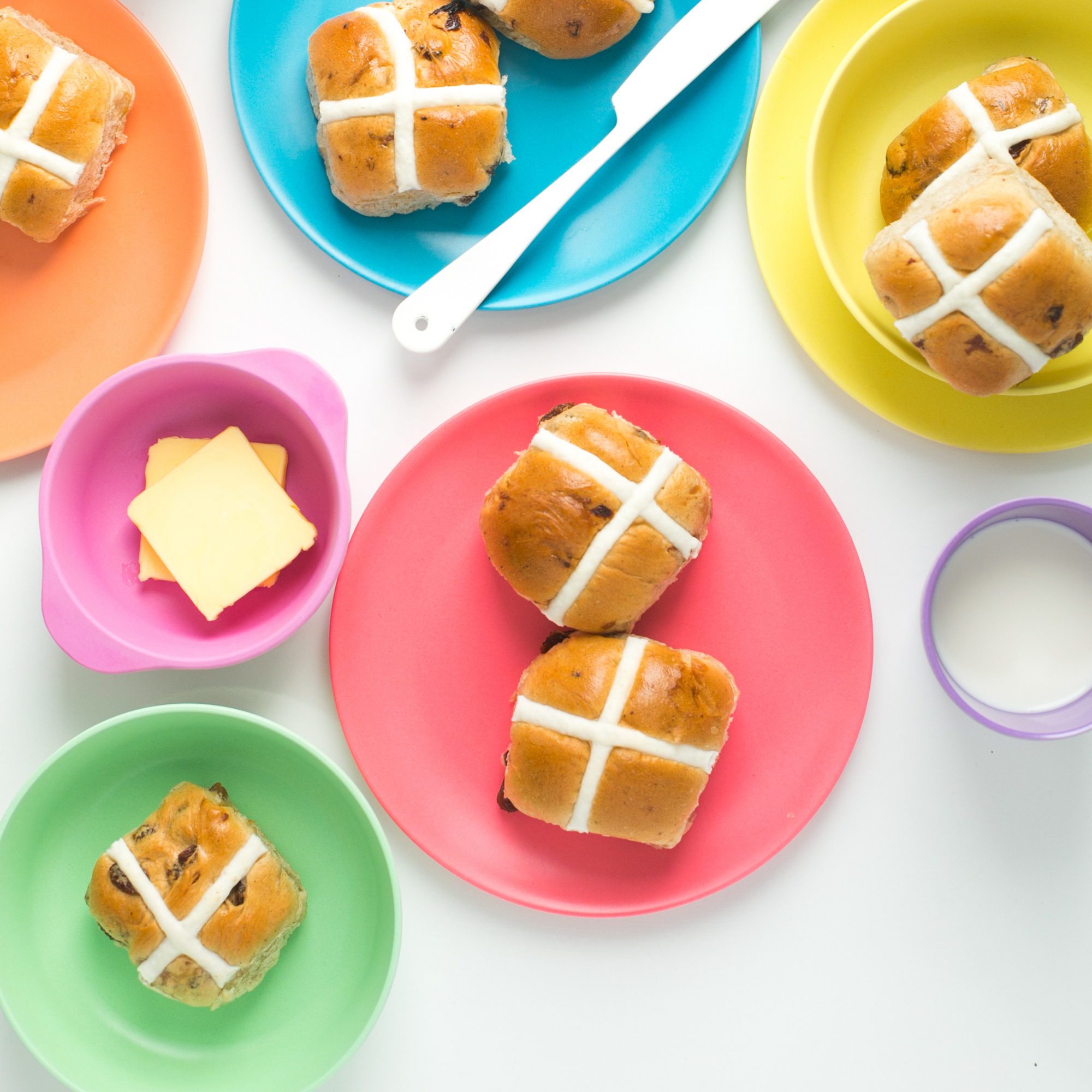 colorful bamboo plates with hot cross buns