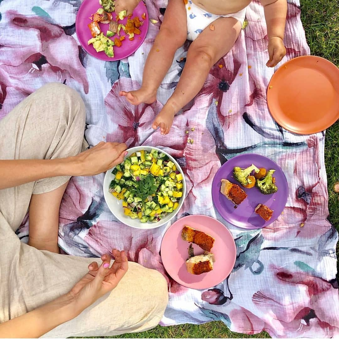 a mom having a picnic with her daughter